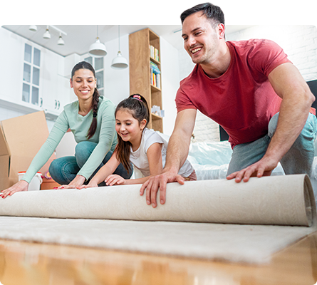 family rolling up rug