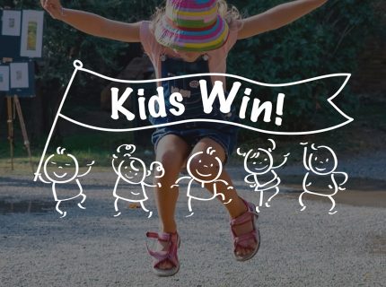 girl jumping with kids win overlay